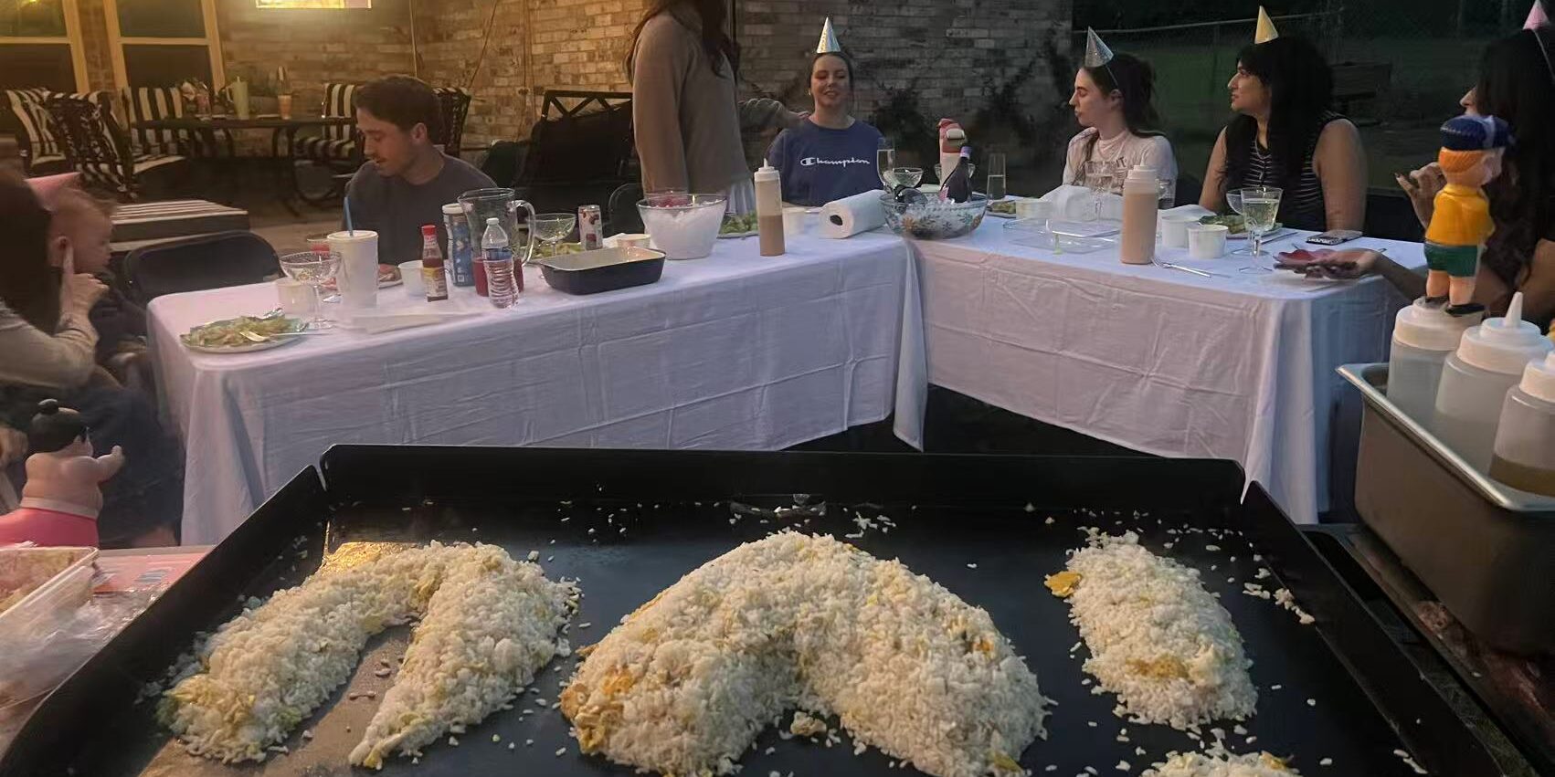 Private hibachi chef serving an adult group dinner setup in Scarborough Private hibachi chef serving an adult group dinner setup in Scarborough
