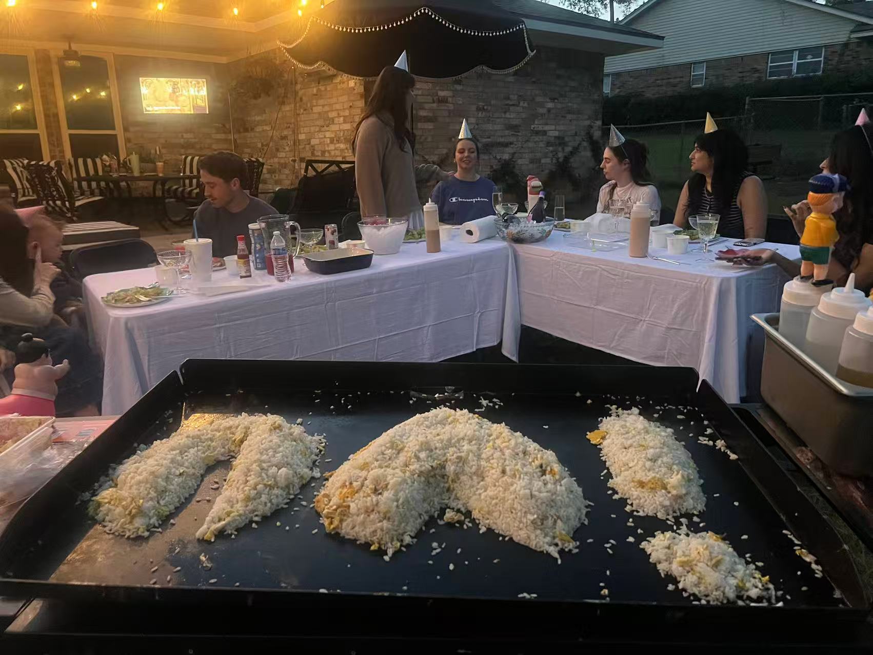 Private hibachi chef serving an adult group dinner setup in Scarborough